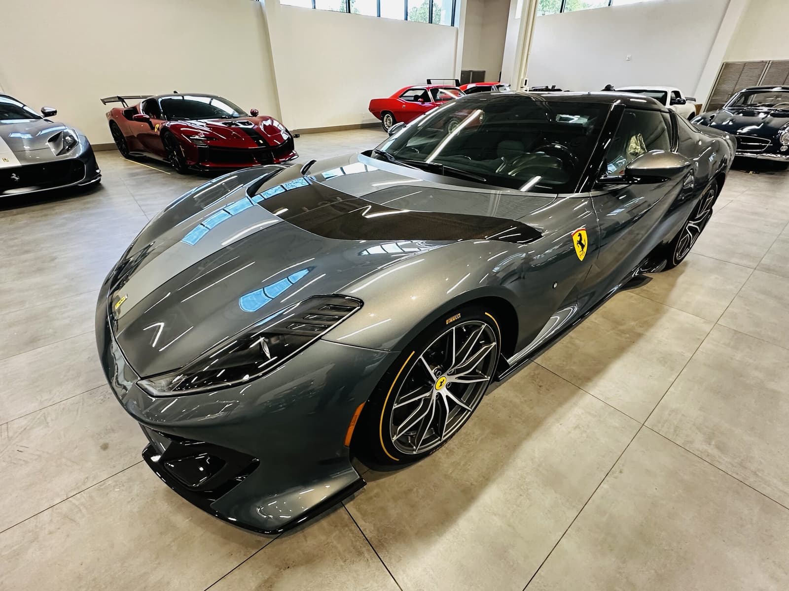 Ferrari 812 Competizione with XPEL Ultimate Premium PPF in the Auto SuperShield showroom